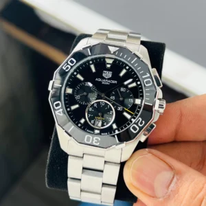 Brand Tag Heuer (7AAA First Copy) Model Aquaracer Calibre 5 Dial Size 45mm Dial Color Black Movement Type Japanese Quartz Display Type Analog with Chronograph Strap Material Stainless Steel