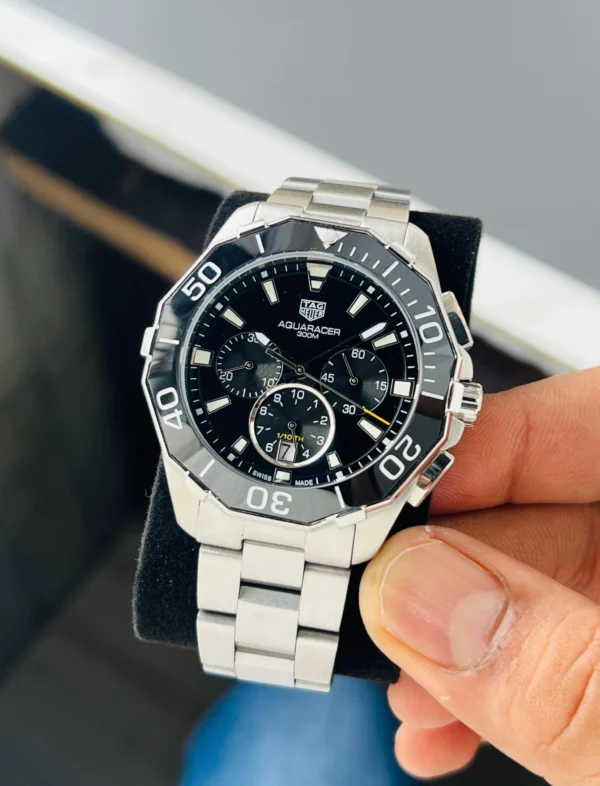 Brand Tag Heuer (7AAA First Copy) Model Aquaracer Calibre 5 Dial Size 45mm Dial Color Black Movement Type Japanese Quartz Display Type Analog with Chronograph Strap Material Stainless Steel