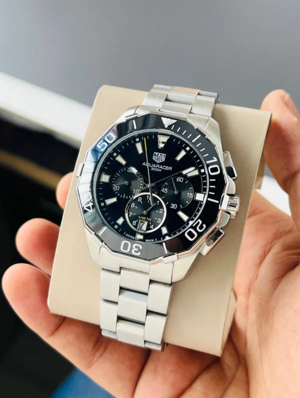 Brand Tag Heuer (7AAA First Copy) Model Aquaracer Calibre 5 Dial Size 45mm Dial Color Black Movement Type Japanese Quartz Display Type Analog with Chronograph Strap Material Stainless Steel