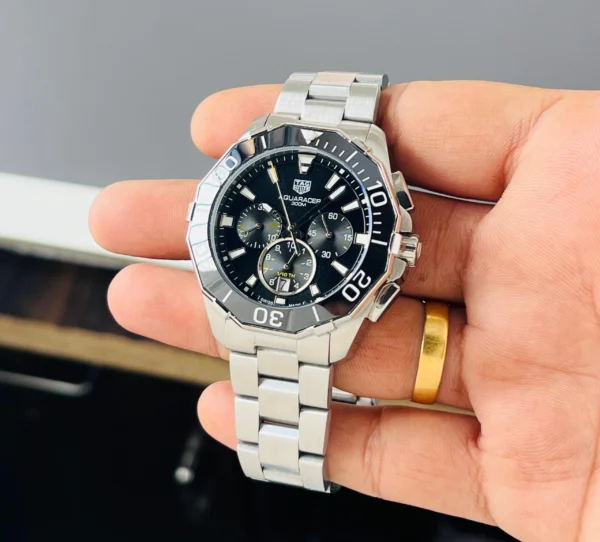 Brand Tag Heuer (7AAA First Copy) Model Aquaracer Calibre 5 Dial Size 45mm Dial Color Black Movement Type Japanese Quartz Display Type Analog with Chronograph Strap Material Stainless Steel